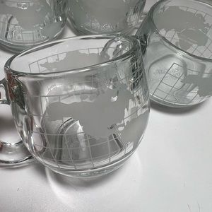 Vintage glass coffee mugs with etched world map. Set of 4